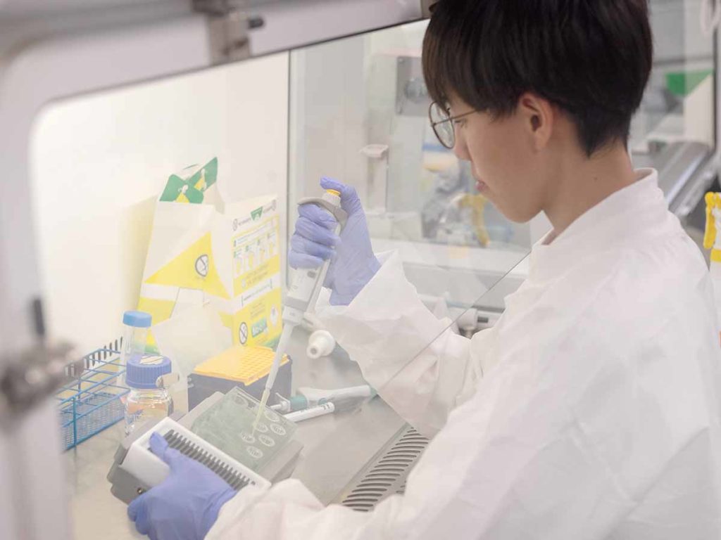 CN Bio scientist in lab
